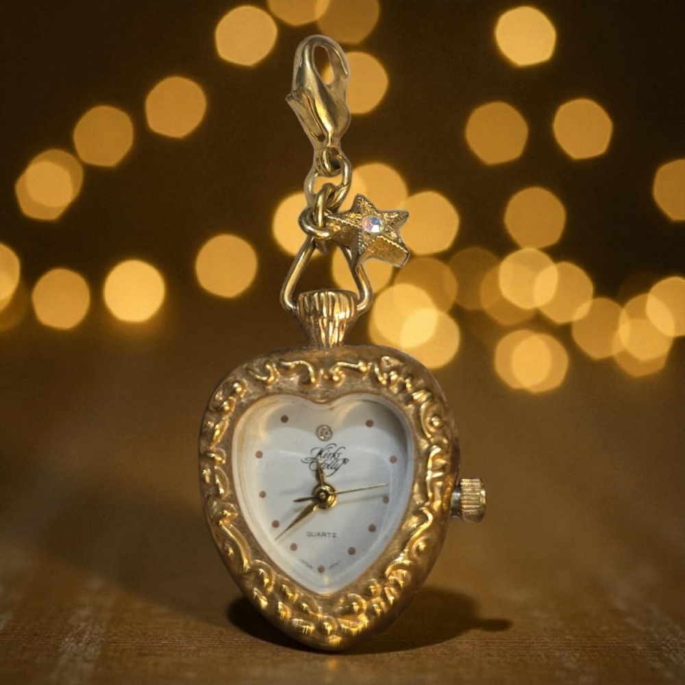Vintage KIRKS FOLLY - Gold Heart-Shaped Quartz Keychain Watch With A Star‎